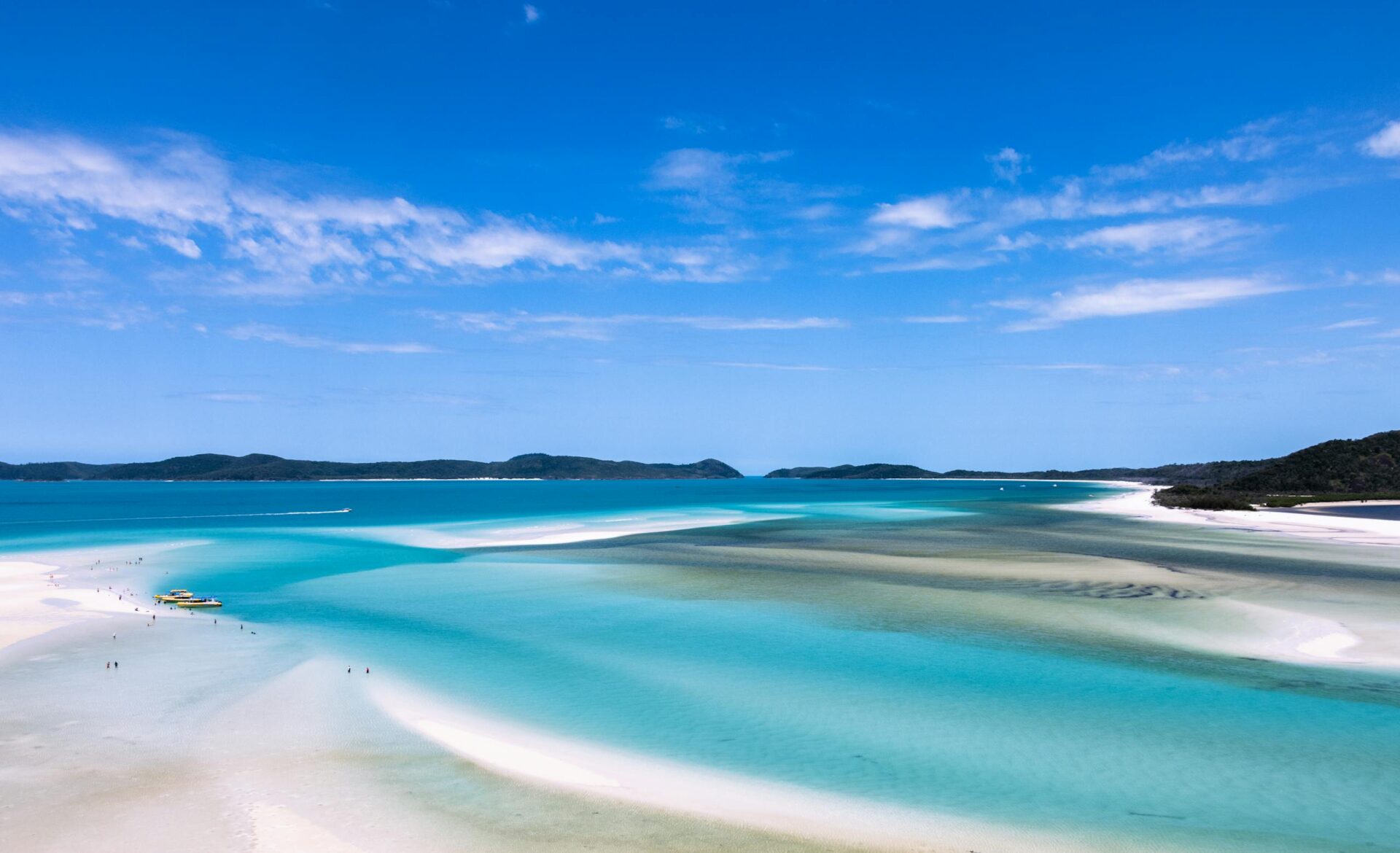 Experience the breathtaking turquoise waters and white sands of the Whitsundays, Australia.