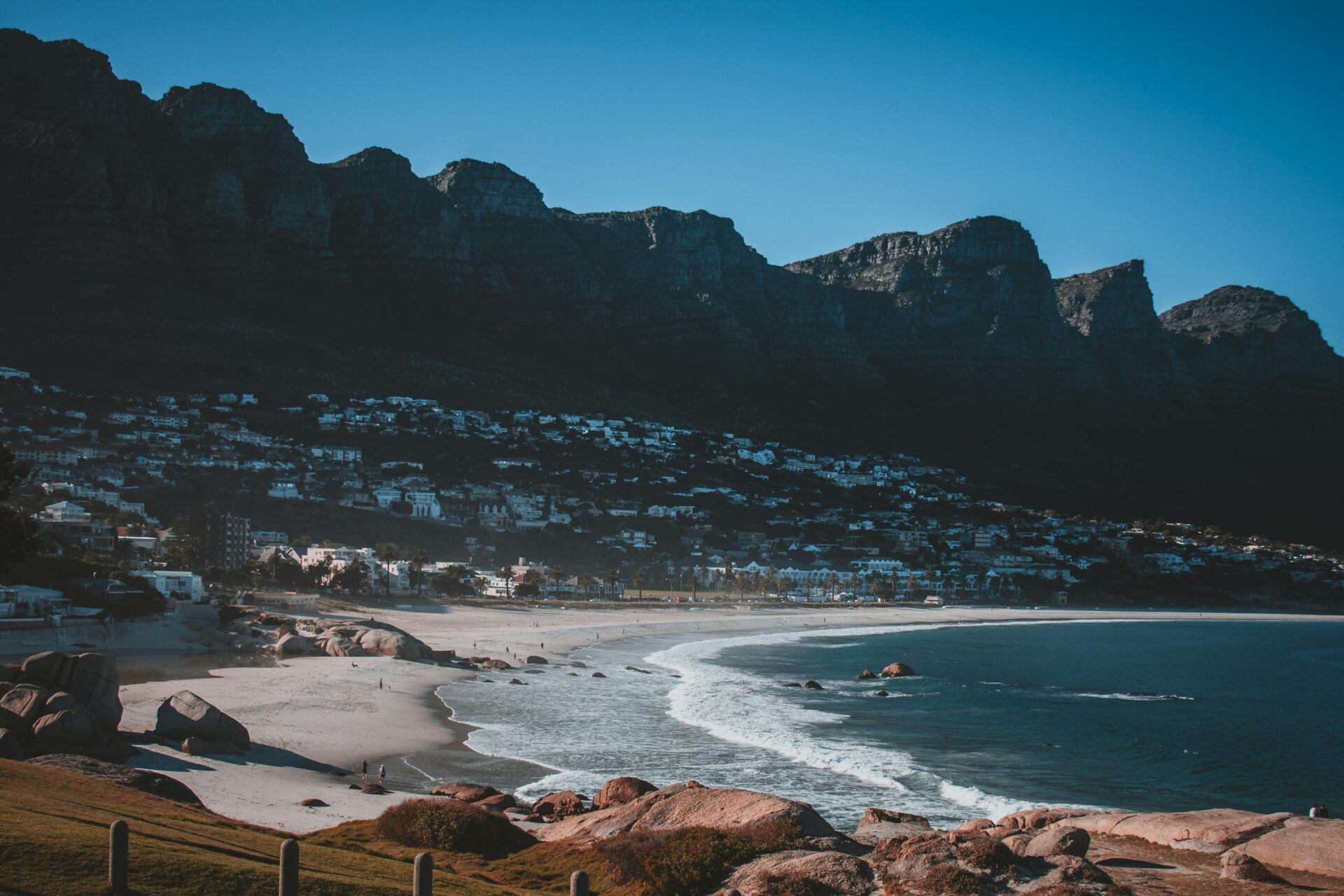 Scenic view of Camps Bay beach with Twelve Apostles mountains. Perfect for travel, nature, and landscape photography lovers.