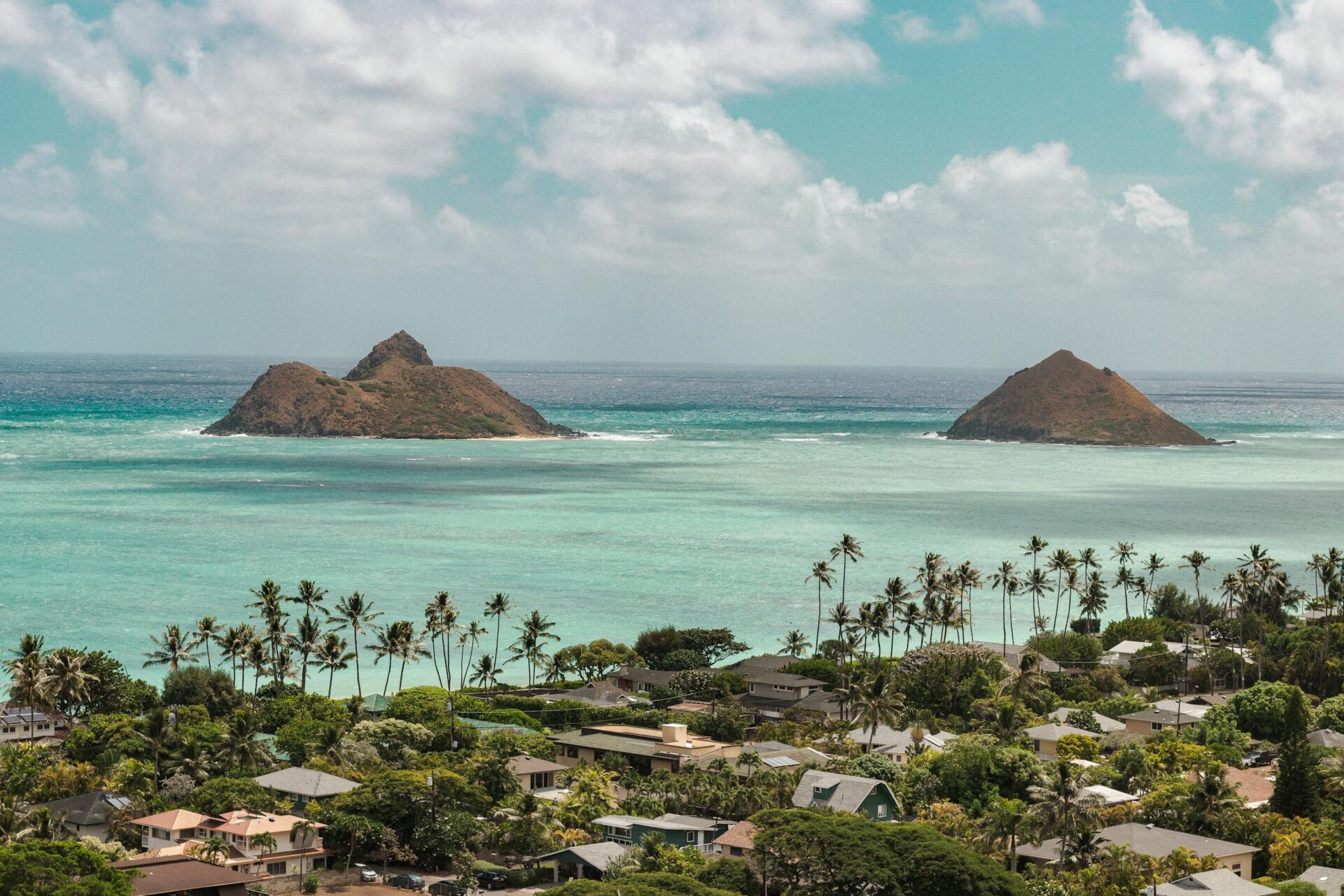 Stunning aerial view of Lanikai Beach with Mokulua Islands in the background, Oahu, Hawaii.